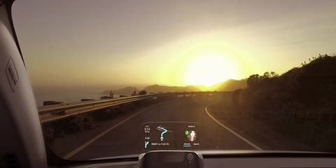 The Navdy head-up display is visible in direct sunlight.