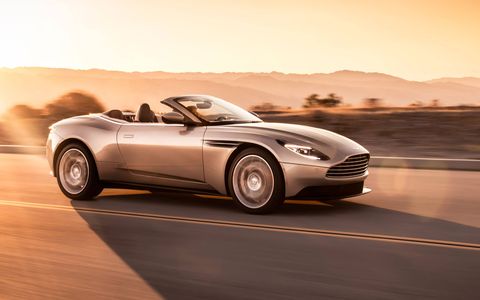 The Aston Martin DB11 Volante is the most recent in a long line of drop-tops based on the company's grand tourers. This new convertible gets a 503 hp, 513 lb-ft V8 from the automaker's technical partner AMG.