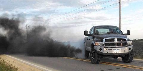Rolling coal is the practice of modifying a diesel engine to increase the amount of fuel entering the engine in order to emit an under-aspirated sooty exhaust that visibly pollutes the air. It can also include the intentional removal of the particulate filter. Practitioners often additionally modify their vehicles by installing smoke switches and smoke stacks. Modifications to a vehicle to enable rolling coal cost from $200 to $5,000. -- Wikipedia