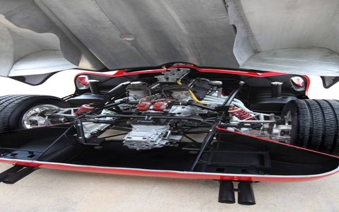 The V12 engine makes this Ferrari look like the matryoshka doll of sports cars. Art inside more art.