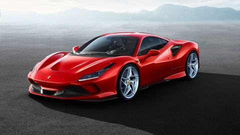 The Ferrari F8 Tributo, successor to the 488 GTB, is powered by a turbocharged 3.9-liter V8 producing 710 hp. Styling elements like the quad taillights and louvered rear windscreen pay tribute to past Ferrari greats.