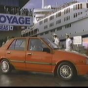 Who wouldn't want to buy this beauty? We can picture it now -- sitting in a subcompact car watching people get in and out of a cruise liner they can't afford to be on. Ah, the '80s.
