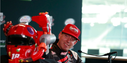 Kyle Busch made light of his sharp tongue with this promotional Skittles helmet on Friday at Indianapolis.