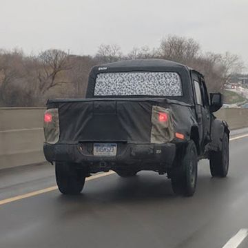 We spotted the 2019 Jeep Wrangler Scrambler pickup testing in metro Detroit.