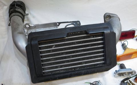 I had to remove one of the intercoolers from the Mazda Millenia S that gave me the supercharger, so I decided to add it to my stash-o-parts.