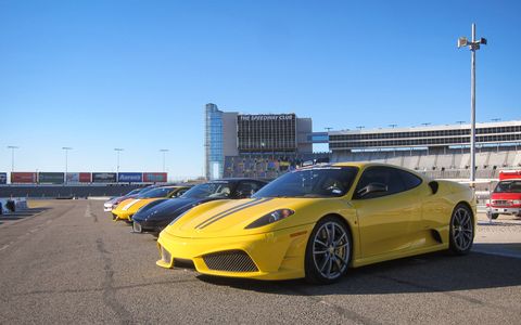 Supercars lined up at Texas Motor Speedway for Fittipaldi Exotic Driving