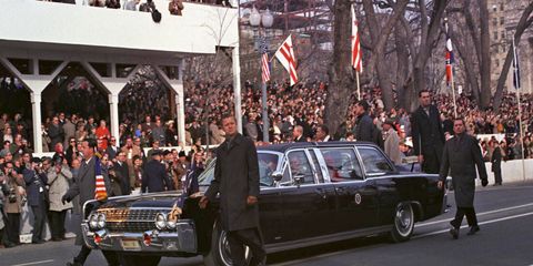 The X-100 was redesigned and put back into service after Kennedy's death. Here it wears a special inauguration plate during the inauguration parade of Lyndon Johnson in 1965.