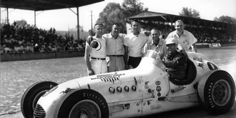 Clint Brawner, fourth from the left, with driver Jimmy Bryan and the rest of his crew at the 1954 Indy 500.