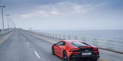 The 2020 Lamborghini Huracan Evo on the road with a new front bumper and "exposed" hexagonal mesh rear-end