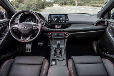 The 2018 Hyundai Enantra GT's optional Style Package adds a leather-wrapped steering wheel, heated front seats blind-spot detection and side-mirror turn-signal indicators.