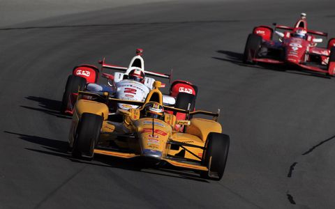 Ryan Hunter-Reay won a crash-marred Verizon IndyCar Series race at Pocono.