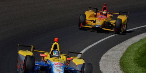 Townsend Bell, left, and Ryan Hunter-Reay dominated much of the first half the 100th Indianapolis 500.