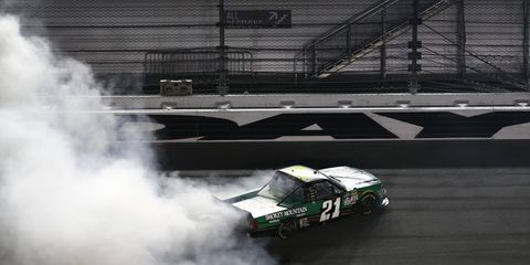Johnny Sauter does a burnout Friday night after winning the Camping World Truck Series opener in Daytona.