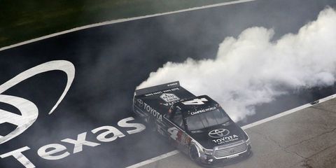 Erik Jones does a celebratory burnout on Friday night after winning in Texas.