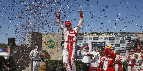 Scott Dixon took the lead with three laps to go and never looked back Sunday at Sonoma.
