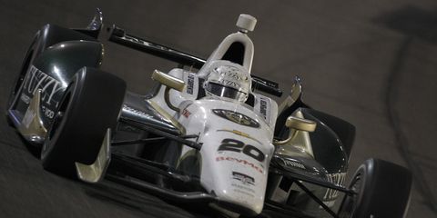 Ed Carpenter, shown driving in 2014, will be back in 2015 as part of CFH Racing. The team will be using Chevy engines and aero kits.
