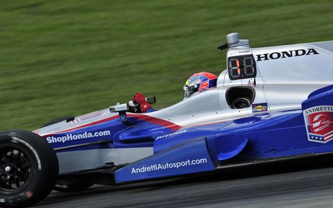 Justin Wilson, 37, died from injuries suffered Sunday at Pocono. He was stuck in the helmet by crash debris and was in a coma until his death on Monday. Here he races at the Mid-Ohio Sports Car Course.