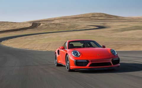 The 2017 Porsche 911 Turbo S, shown here, makes 580 hp from its twin-turbo flat six engine for a top speed of 205 mph.
