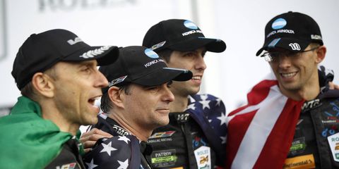 Jeff Gordon celebrates with Ricky Taylor, Jordan Taylor and Max Angelelli at Daytona Sunday.