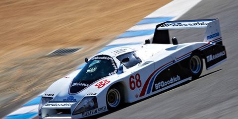 Lola T616 winds down the Corkscrew during the 2012 Rolex Monterey Motorsports Reunion.