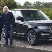 Gerry McGovern and Richard Branson pose next to an Astronaut Edition Range Rover.