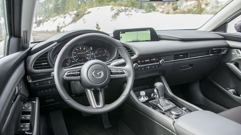 The interior of the Mazda3 offers impressive ergonomics along with a muted but elegant design.