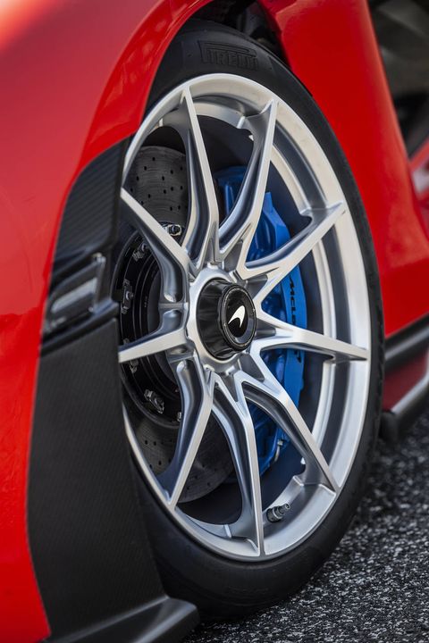 Ultra-lightweight 9-spoke, center-lock super-forged alloys with bespoke Pirelli P Zero Trofeo R tires 245/35R19s front, 315/30R20 rear