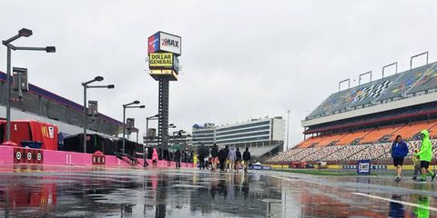 NASCAR's night race at Charlotte was postponed until Saturday afternoon because of rain.