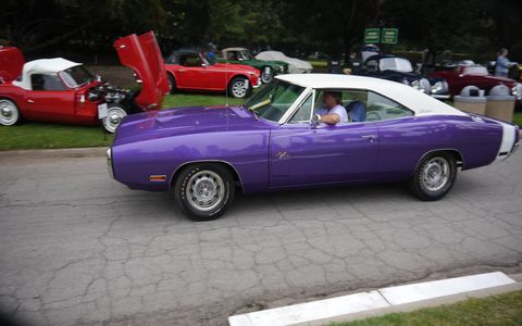 Muscle cars make up much of the madness. Doncha love the grape color?