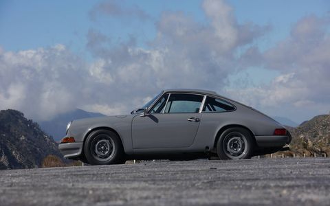 LA Motorworks 5001 makes old Porsches with just the right new parts. The balance is wonderful fun. This is their 1973 911 T in Nardo gray.