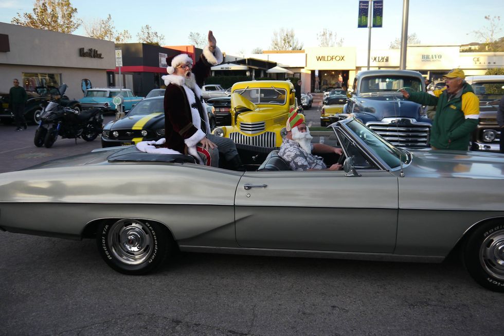 Santa took time out of his busy pre-Christmas schedule to visit Wheels & Waves car show on Sunday. The last W&W was cancelled when the Woolsey Fire tore through the canyons and hills of The 'Bu. Sunday's show was the first car show since the fires. Thank you Fireball Tim, who put it on, along with sponsors and volunteers..