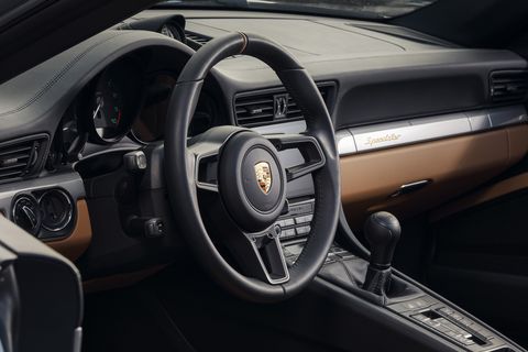 Deep bucket seats come in the Porsche 911 Speedster and a clutch pedal. All U.S. cars include the center console screen for the mandatory back-up camera