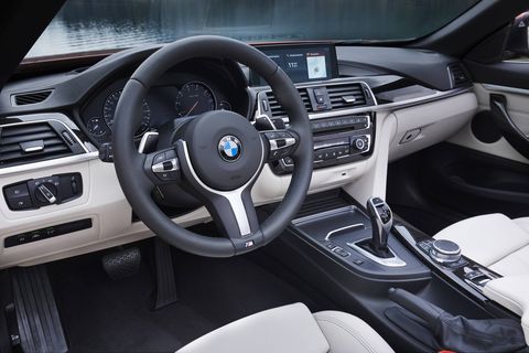 Inside, the BMW 430i features chrome accents, a gloss black center console and double stitching on the instrument panel.