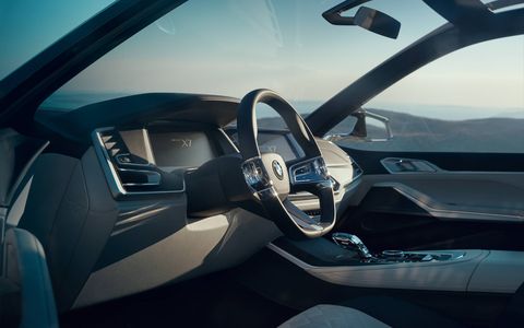 The X7's interior is "reduced to the essentials" according to BMW, except for the huge 12.3-inch screen behind the wheel and central infotainment screen next to it.