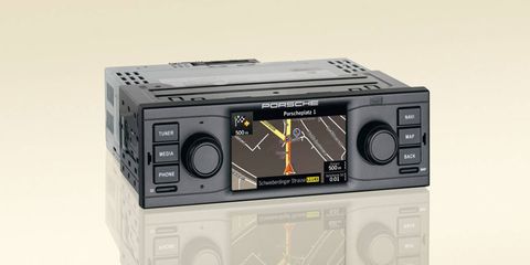 The vintage look of this nav radio head unit tries to keep your old Porsche from looking new.