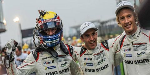 Left to right: Mark Webber, Timo Bernhard, Brandon Hartley celebrate the win.