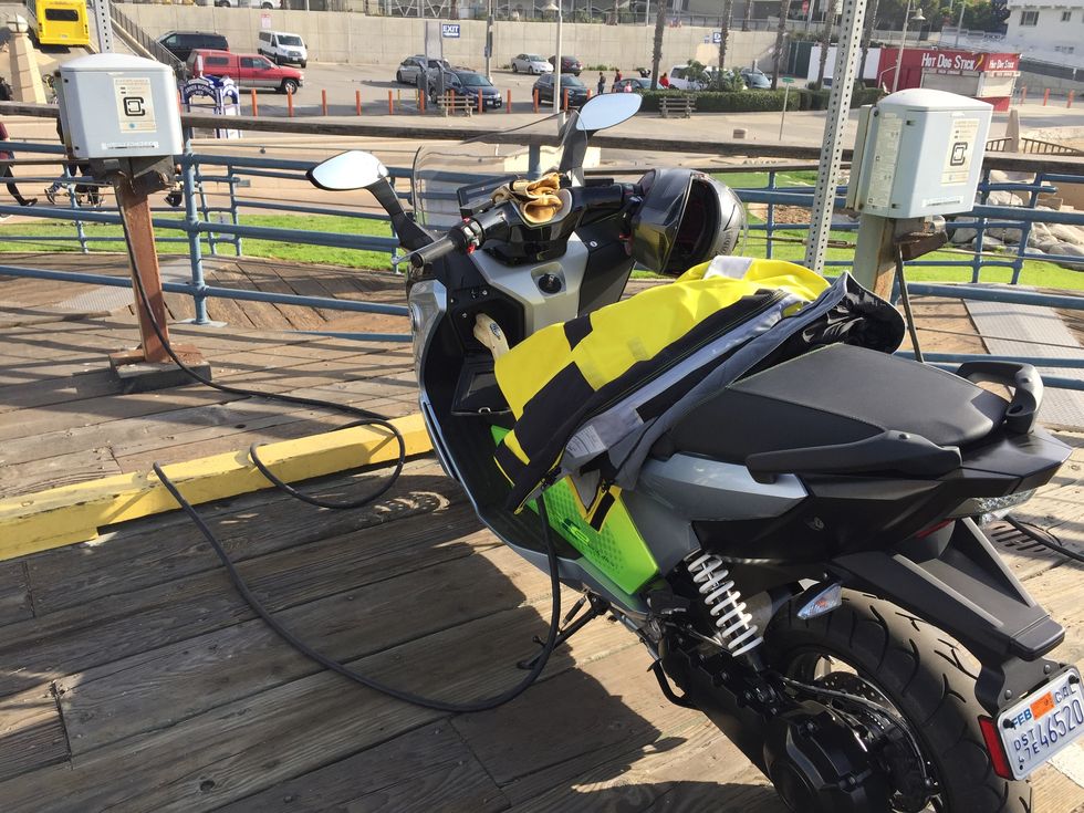 BMW C evolution scooter receives a vital intake of juice on the Santa Monica pier