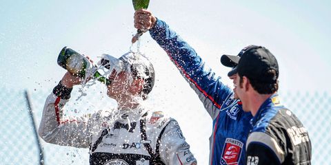 Graham Rahal, being showered after his win at Mid-Ohio, moved to within striking distance of his first Verizon IndyCar Series championship.