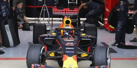 Pierre Gasly tests the latest halo head-safety concept for Red Bull Racing on Tuesday at Silverstone Circuit in England.