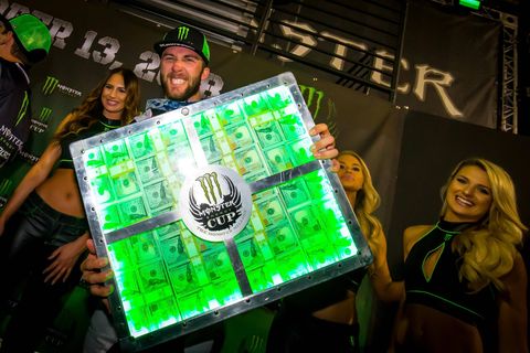 Eli Tomac rode his Kawasaki to victory - three victories in all three races of the event, to be precise - in the 2018 Monster Energy Cup at Sam Boyd Stadium in Las Vegas. By winning all three of the evening's races Tomac also won $1 million, presented in a fluorescent green-glowing metal case.