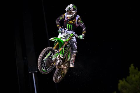 Eli Tomac rode his Kawasaki to victory - three victories in all three races of the event, to be precise - in the 2018 Monster Energy Cup at Sam Boyd Stadium in Las Vegas. By winning all three of the evening's races Tomac also won $1 million, presented in a fluorescent green-glowing metal case.