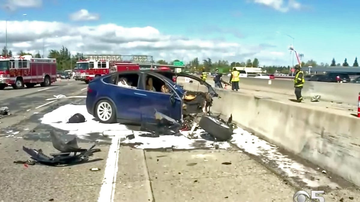 Tesla: Crash Was Worsened By Missing Freeway Barrier Shield - CBS