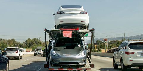 Expect to see more car carriers full of Model 3s this holiday season.