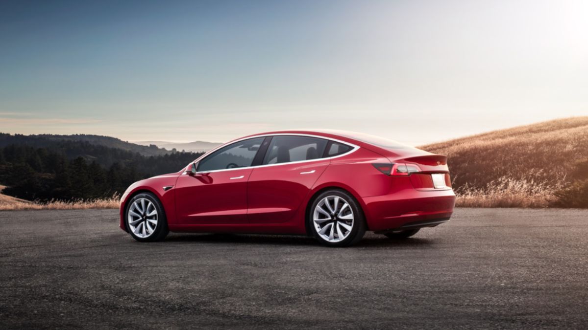 Tesla shows off new electric semi-trucks amid struggles - CBS News