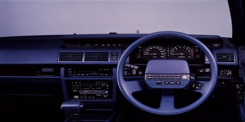 There are any number of modern technologies that can do what Nissan's steering wheel-mounted dialer set out to accomplish, but none of them are as cool.