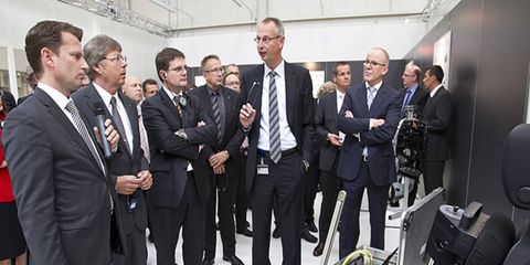 Tuch, center, has been head of VW quality control since 2010. Before that he worked at Porsche.