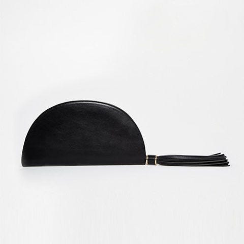 black circle clutch bag