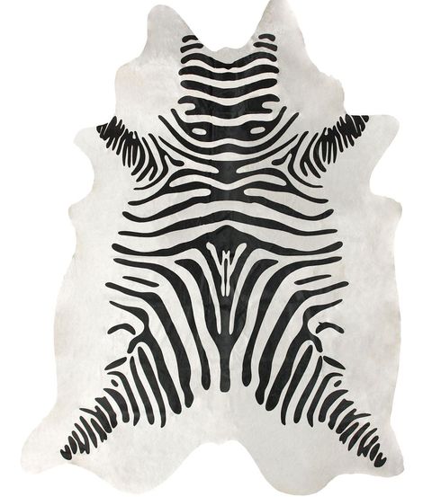 <p><strong><em>from $1,429, </em></strong><a href="http://www.rugsusa.com/rugsusa/rugs/rugs-usa-zebra-cowhide/white/200NKCHP01-507.html?product_open=true" target="_blank"><strong><em>rugsusa.com</em></strong></a></p><p>If you've been craving an animal-print statement rug to give a luxe touch to your home office, you can't do much better than this zebra-printed cowhide pick. The beautiful coat and soft pile makes this a dream to pad around on.</p>