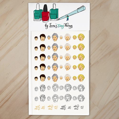 <p><strong data-redactor-tag="strong" data-verified="redactor"><em data-redactor-tag="em" data-verified="redactor">Stay Golden Nail Decals by JanesTinyThings<br>$9</em></strong> <a href="https://www.etsy.com/listing/180194330/stay-golden-handpainted-golden-girls?" target="_blank" class="slide-buy--button" data-tracking-id="recirc-text-link">BUY NOW</a><br>Next time you throw a <i data-redactor-tag="i">Golden Girls</i>-themed party, make sure these are on your nails.&nbsp;</p>