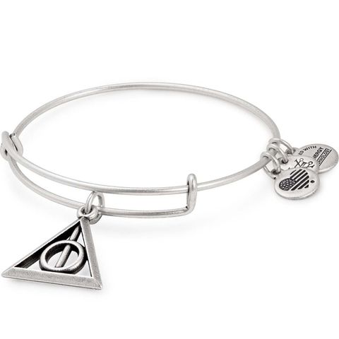 <p><strong data-redactor-tag="strong"><em data-redactor-tag="em">$28</em></strong> <a href="https://www.alexandani.com/deathly-hallows-charm-bangle-as17hp21rs.html" target="_blank" class="slide-buy--button" data-tracking-id="recirc-text-link">BUY NOW</a><span class="redactor-invisible-space" data-verified="redactor" data-redactor-tag="span" data-redactor-class="redactor-invisible-space"></span></p><p><span class="redactor-invisible-space" data-verified="redactor" data-redactor-tag="span" data-redactor-class="redactor-invisible-space">While the adjustable Deathly Hallows bracelet is a bit more understated, this one is slightly bolder and meant to be stackable. It comes in gold and silver.&nbsp;</span></p>